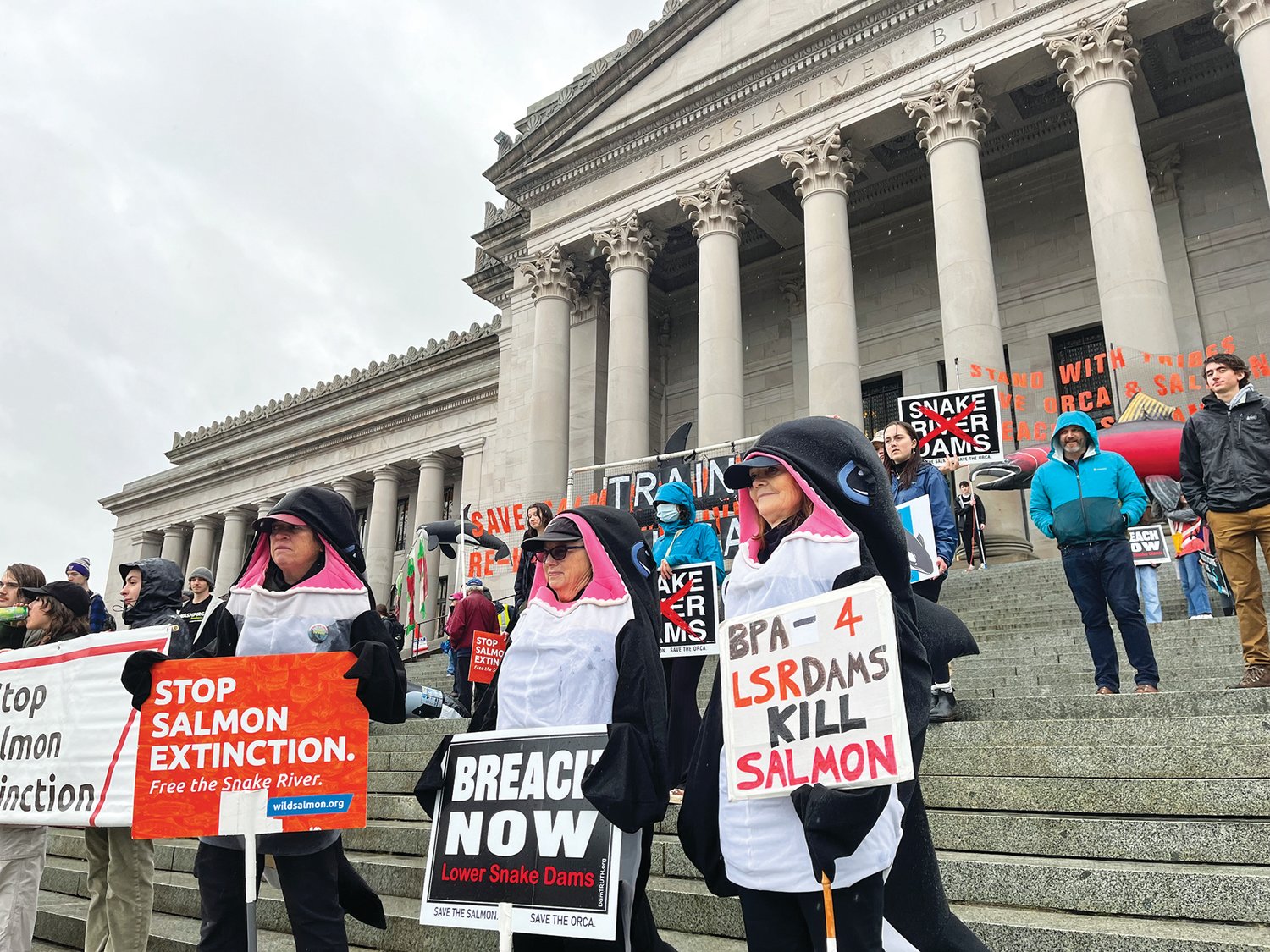 Members of the Washington Youth Ocean and River Conservation Alliance and the Earth Ministry/Washington Interfaith Power & Light marched from The Olympia Ballroom to the steps of the Capitol Jan. 13.